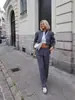 Comercio exterior transfronterizo al por mayor 2026 nuevo conjunto de moda europea y americana para mujer: top a rayas corto de cuello alto + pantalones de pierna ancha