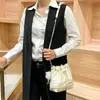 Bolsa Nueva con Cordón Textura de Nicho Hombro Único Cruzada Temperamento Bolso Cubo Moda Retro Francesa Tendencia Bolso para Mujer