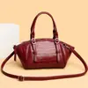 2026 Nuevo Bolso Vintage con Patrón de Cocodrilo Versátil para el Trabajo Hombro Cruzado Bolso para Mujer Forma de Concha Boston Bag Al por Mayor