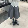 Saia de Lã Grossa Estilo Casual com Flor Bud Meio-Comprimento para Mulheres Inverno 2026 Nova Elegante Versátil Emagrecedora Saia Lápis de Comprimento Médio