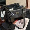 Bolso de axila para mujer 2026 Nuevo estilo de alta gama diseño de nicho bolso de hombro cruzado primavera y verano superventas bolso cuadrado pequeño