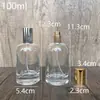 En stock B115-30ml50ml100ml botella de perfume de vidrio transparente, botella de recarga cosmética/botella vacía con spray de presión