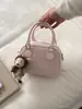 Bolsa de Mão Nova Tendência Simples e Estilosa Bolsa Bowling para Mulheres Moda Retrô Bolsa de Ombro Versátil Bolsa Transversal para Mulheres