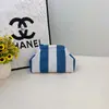 Bolso de mano simple de punto a rayas, bolsa tejida versátil de gran capacidad más vendida, bolso nube de alta gama