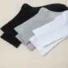 Calcetines de algodón puro para hombre hasta la pantorrilla en colores lisos negro, blanco y gris, adecuados para uso de negocios y casual, absorbentes del sudor y transpirables, para primavera, otoño e invierno