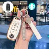 Adecuado para funda de llave Nissan 2026 modelo nuevo hebilla de concha de alta gama para mujer Teana Hongmeng Cockpit modelos 26 2026 Nissan Dongfeng