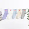 Meias femininas cano alto para barras paralelas meias confortáveis respiráveis de algodão estilo acadêmico meias masculinas e femininas grande quantidade excelente atacado de fábrica