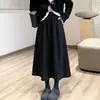 ¡Contrarresta el pedido! ¡Falda de botón tridimensional estilo Hepburn! Tela de lana europea otoño e invierno falda larga elegante para mujer