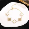 Pulsera de Trébol de Cuatro Hojas Más Vendida en Comercio Electrónico Transfronterizo, Acero de Titanio con Incrustación de Diamantes de 18K, Lujo Ligero, Sensación de Alta Gama, Sencilla, Moderna, Versátil