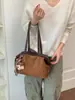 Bolsa de ante francesa para axila, nova coleção outono/inverno 2026, bolsa tote retrô americana, adequada para o trabalho e uso casual, bolsa de ombro e bolsa de mão