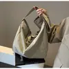 Bolso tote para mujer, único, simple y elegante, bolso de mano, bolso de hombro, textura casual, nuevo bolso de axila para mujer, nuevo modelo 2026
