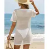 Ropa de mujer estilo europeo y americano nueva, sexy con huecos, manga corta, casual, cubierta de bikini para traje de baño, cubierta para la playa, camisa de protección solar