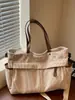 Bolsa de Lona Casual de Gran Capacidad para Viaje 2026 Nueva Llegada Otoño Bolsa de Equipaje de Alto Valor Personalidad Bolso de Hombro Cruzado de Moda