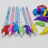 Corrector de postura de escritura para estudiantes, de silicona, con forma de delfín y pez pequeño