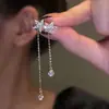 Arete de clip de oreja en forma de arco con cinco circones de alta gama Dongdaemun Coreano para mujer, Elegante estilo frío Ins, Arete de clip personalizado para mujer