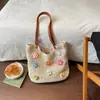 Bolso de hombro casual estilo coreano tejido floral, nuevo modelo 2026 de punto calado, bolso de playa, bolso de playa