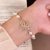 Pulsera de Mariposa y Perla con Circonita Bañada en Oro Real de 18 Quilates para Mujer, Gama Alta, Lujo Ligero, Pulsera Elegante, Joyería de Mano Exquisita Estilo Francés