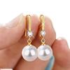 Directo de fábrica moda europea y americana pendientes de metal y perla pendientes largos flor rhinestone cruz pendientes transfronterizos pendientes mujer