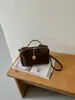 Bolso de mano tipo almohada retro de nicho coreano transfronterizo para mujer, nuevo y elegante bolso de hombro y cruzado de alto valor para el día a día