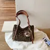 Bolso moderno de gran capacidad con estampado de leopardo para mujer, nuevo modelo 2026, bolso de hombro versátil para el día a día, bolso tote de estilo relajado, transfronterizo