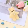 Juguete de peluche de conejo suave y esponjoso de pelo rizado con rubor, bordado y pajarita de perlas, colgante de conejo pequeño, accesorios de producto semiacabado al por mayor