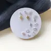 Set de Aretes de Una Semana Combinación Simple Pequeña Aretes Estilo Coreano para Mujer Estilo Estudiante Simple Aretes de Presión Elegantes Versátiles