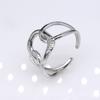 Anillo de acero de titanio estilo europeo y americano exagerado hip hop hueco tres anillos hombres y mujeres apertura ajustable anillo de acero inoxidable joyería