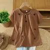 Roupas Femininas Bordadas Plus Size 2026 Primavera/Verão Novo Algodão-Linho Manga Curta Pulôver Camiseta com Fechamento de Botão
