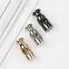 T005 hebilla de resorte de metal de un agujero campana colgante accesorio de cinturón de chaqueta de plumas cuerda de sujeción para cortavientos hebilla de parada hebilla de ajuste