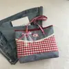Bolsa de Mano con Patrón Estilo Dulce al por Mayor para Mujer Bolsa 2025 Otoño Nuevo Bolso de Hombro con Lazo de Encaje Bolso de Axila