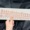 Nuevas Tiras de Uñas Portátiles al por Mayor Cortas Redondas Estilo Coreano Coloridas Lunares Rosa Nude Uñas Lindas Femeninas