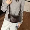 Bolso de hombro y bandolera versátil, simple y elegante, de nicho, para mujer, verano 2026, nuevo diseño tejido de albóndiga