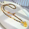 Retención de Color Alta Nuevo Estilo Chino Bolsa de Terciopelo Incrustada con Diamantes Collar de Piedra Ojo de Tigre Calabaza Cadena de Suéter Fulu Estilo Chino CNC para Mujer