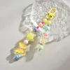 Nueva cadena creativa para teléfono móvil hecha a mano con cuentas, colgante de mariposa acrílica de colores, colgante para coche, adornos para mochila DIY