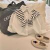 Camisa con cinta estilo primavera y otoño 2026 para niños, marca moderna, top de camisa a rayas con bolsillo, estilo japonés para bebé