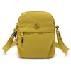 Bolsa de teléfono ligera de lona para mujer, minibolso, nuevo y versátil bolso cruzado casual de tela Oxford para mujer