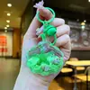 Llavero de Estrella de Cinco Puntas Acrílica con Concha de Estrella de Mar Rellena de Aceite y Arena Líquida Colgante para Mochila Decoración de Llavero Estrella Venta al por Mayor