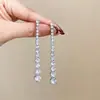 Novos brincos longos estilo coreano de 2026 com strass brilhantes e franjas, apresentando um design chique, único e versátil com uma estética de alta qualidade