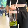 Botella de agua de plástico de gran capacidad con correa y pajilla, taza espacial portátil de mano para exteriores, fitness, senderismo y deportes, estilo coreano