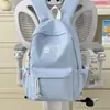 Mochila de nailon de color liso de alta moda 2026, bolsa de secundaria moderna y ligera con gran capacidad