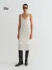 Vestido sin mangas de punto de lana suelta con dobladillo en línea A, textura y sensación de alta gama, con bordes de flecos calados