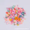 Bolsita de Lentejuelas de 1g en Colores Cremosos, Diseños Mixtos: Flores de Cerezo Grandes, Flores de Cerezo Pequeñas, Corazones, Estrellas de Cinco Puntas, Margaritas, Mariposas Pequeñas, Sirenas, Patas de Gato