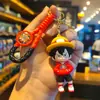 Llavero tejido de una pieza lindo de dibujos animados muñeco de Luffy Sauron colgante de llavero cadena de llaves pareja