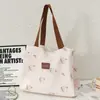 Bolsa de lona suave y linda estilo coreano con patrones en relieve, diseñada para niñas, con un diseño de doble capa y engrosado, gran capacidad y adecuada para la escuela y los desplazamientos.