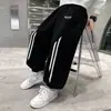 Pantalones deportivos de doble raya de moda para primavera para niños, talla mediana a grande, estilo primavera y otoño, pantalones jogger casuales