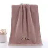 Toalla de vellón de coral suave absorbente toalla de vellón de coral bordada venta al por mayor de fábrica toalla facial bordada lisa toalla facial