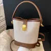 Bolso Coreano de Nicho para Mujer 2026 Nuevo Modelo Bolso Cubo Versátil de Alta Gama Bolso Cruzado de Hombro Patchwork