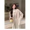 Abrigo corto de lana rosa para mujeres petite, popular este año, nuevo top esponjoso estilo chino otoño/invierno 2026