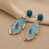 Pendientes largos retro con diseño de nicho único y celebrante de Internet, pendientes de moda de alta gama con sentido del sentido, pendientes para mujer con forma de gota europea y americana.
