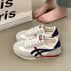 Zapatillas blancas estilo alemán para mujer, versátiles para primavera y otoño, con suela plana y gruesa, nuevo modelo 2026, zapatillas deportivas casuales, zapatillas de skate